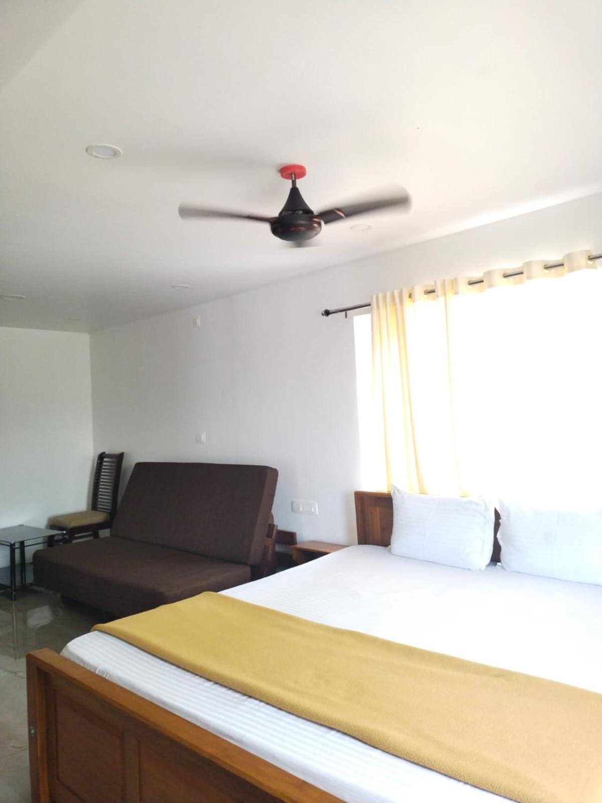 Blossom Valley Cottage Муннар Номер фото